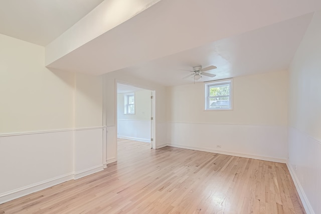 empty room featuring light hardwood / wood-style floors and ceiling fan