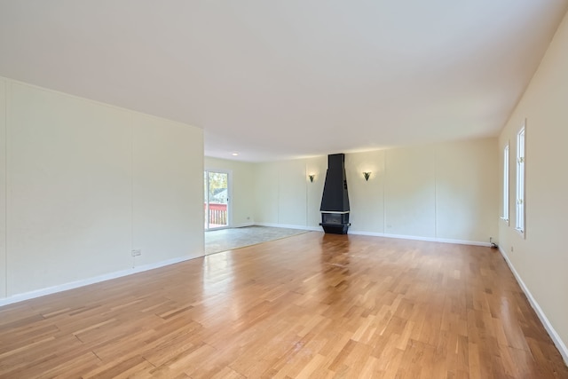 spare room featuring light hardwood / wood-style flooring