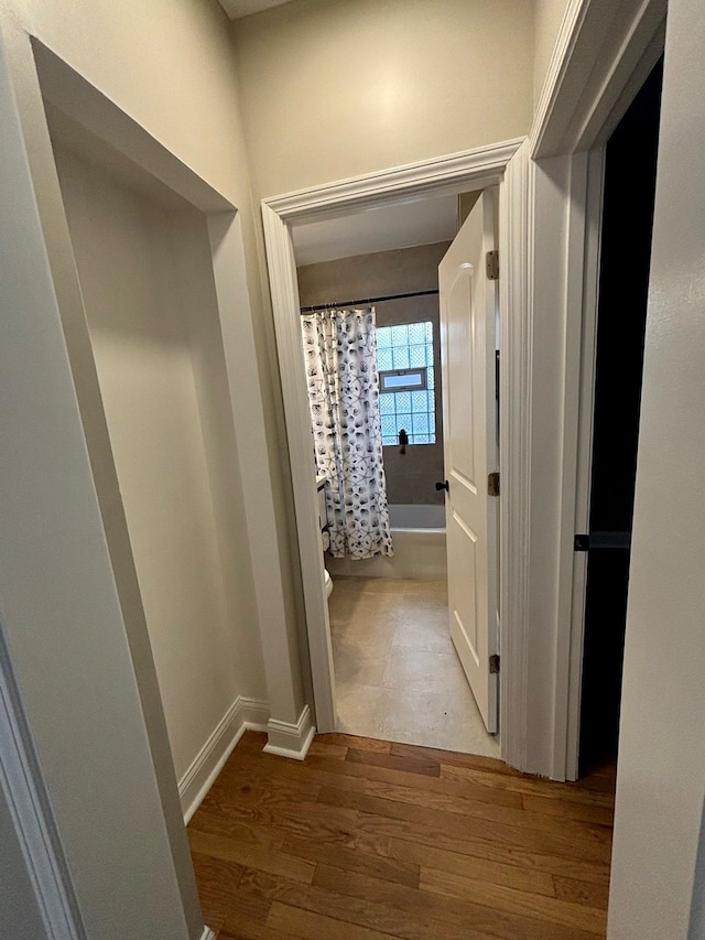 hall featuring wood-type flooring