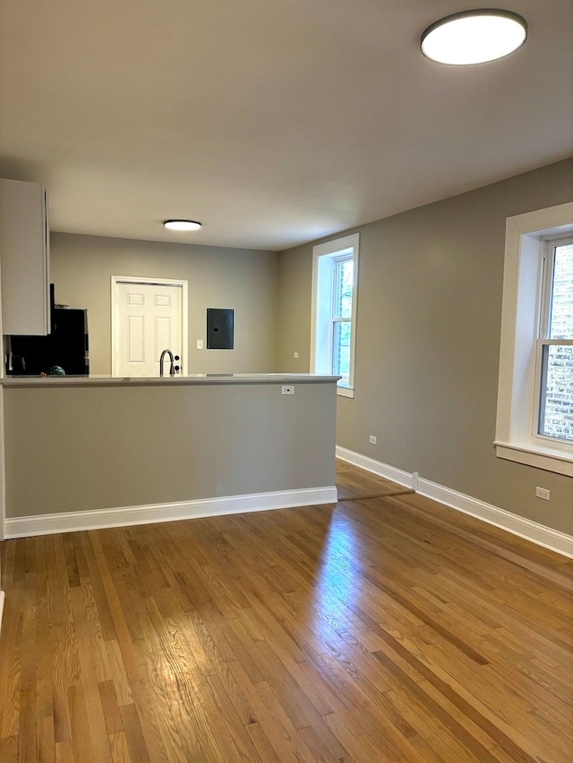 unfurnished room featuring light wood-type flooring