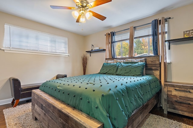 bedroom featuring hardwood / wood-style floors and ceiling fan