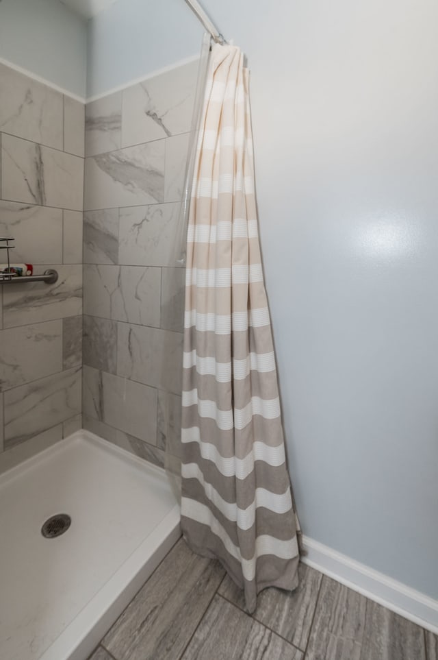 bathroom featuring walk in shower