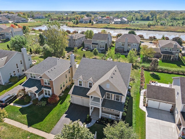 drone / aerial view featuring a water view