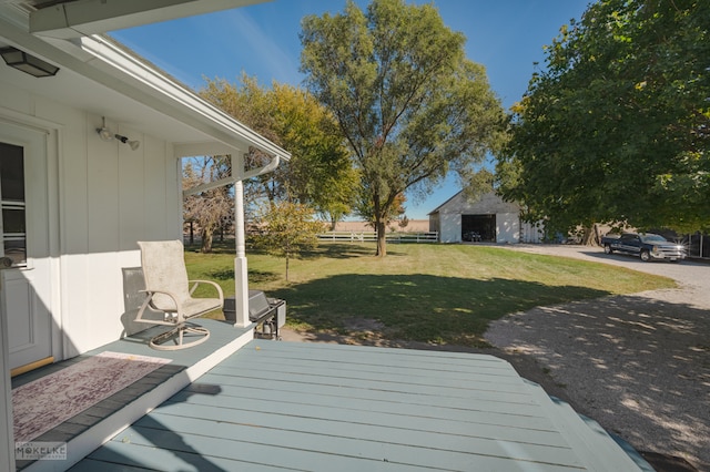 deck featuring a lawn