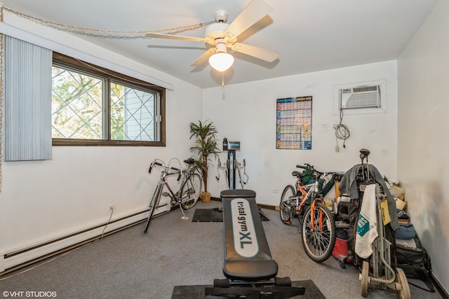 exercise room featuring baseboard heating, carpet, a wall unit AC, and ceiling fan