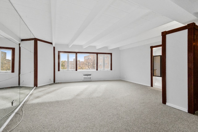 unfurnished bedroom with an AC wall unit, carpet flooring, and beamed ceiling