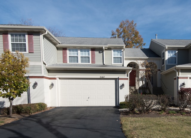 front facade with a garage