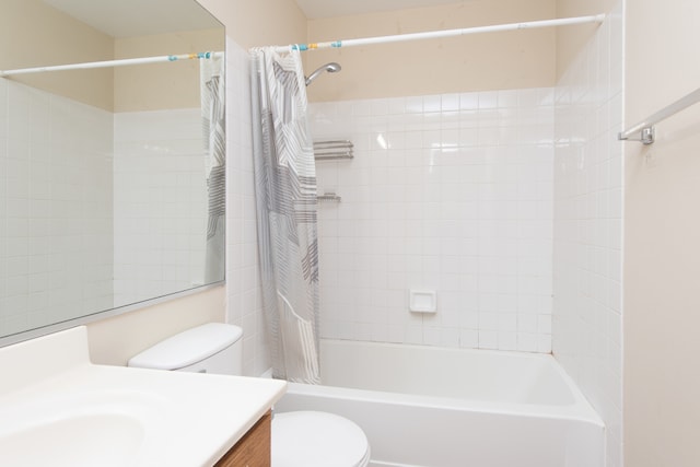 full bathroom featuring toilet, shower / bath combo, and vanity