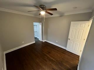 unfurnished bedroom featuring crown molding, dark hardwood / wood-style floors, and ceiling fan