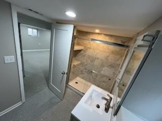 bathroom featuring a shower