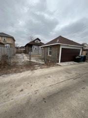 view of property exterior with a garage