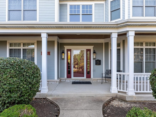 entrance to property with covered porch