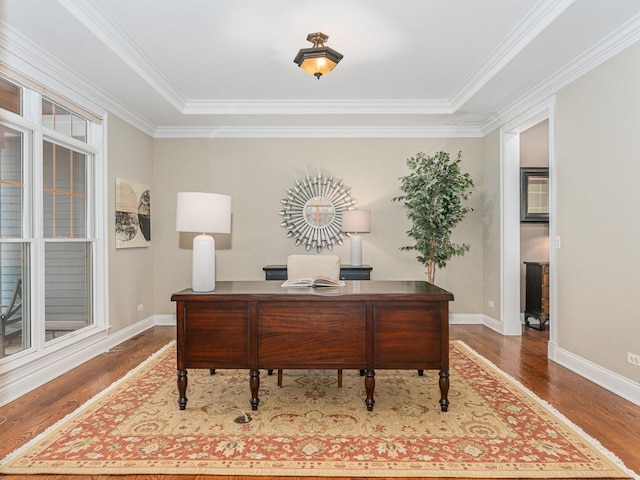 office space with ornamental molding and hardwood / wood-style floors