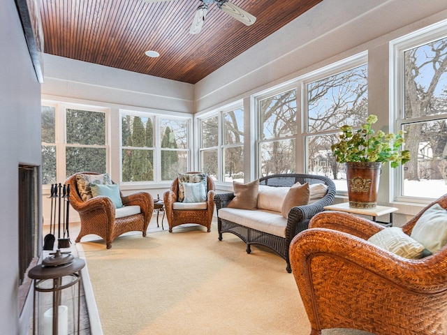 sunroom / solarium featuring wooden ceiling