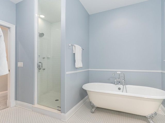 bathroom with tile patterned flooring and plus walk in shower