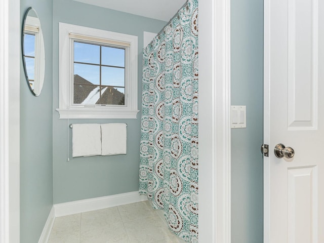 bathroom with tile patterned flooring