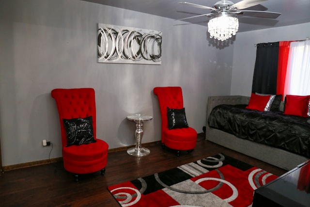 bedroom featuring wood-type flooring and ceiling fan