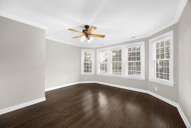 empty room featuring ceiling fan, ornamental molding, and dark hardwood / wood-style floors