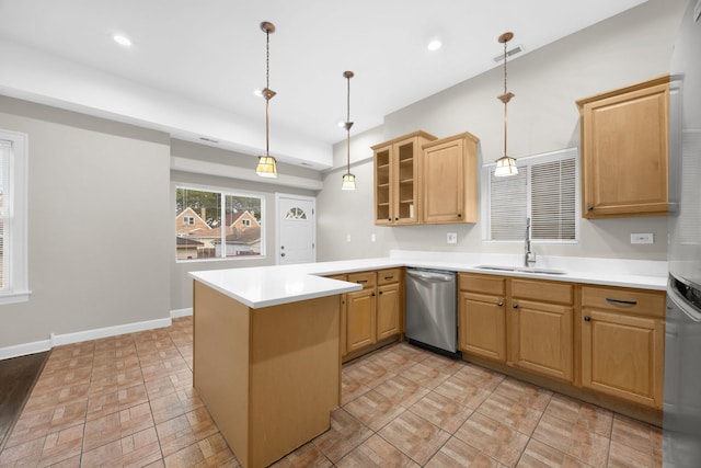 kitchen with sink, dishwasher, kitchen peninsula, and decorative light fixtures