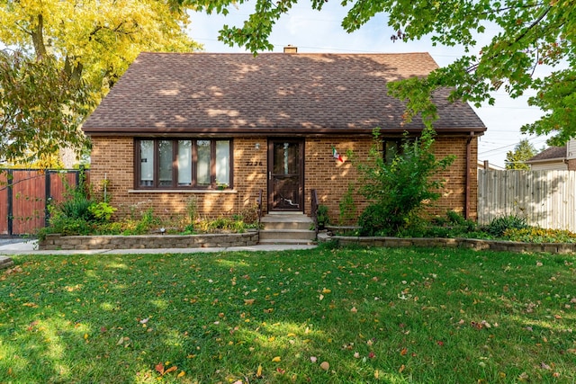 view of front facade with a front lawn