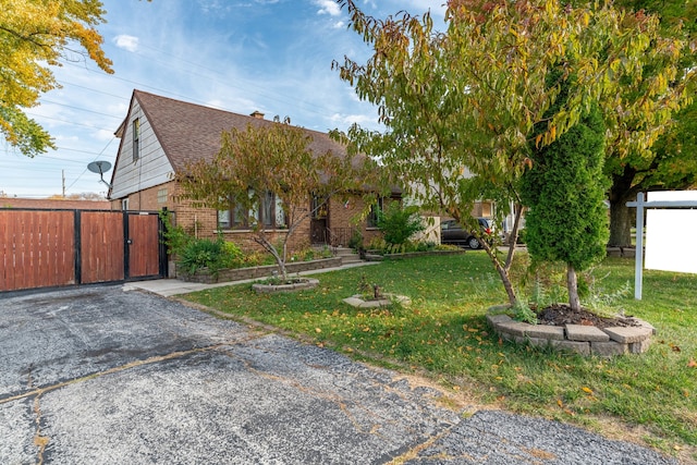 view of front of home with a front yard