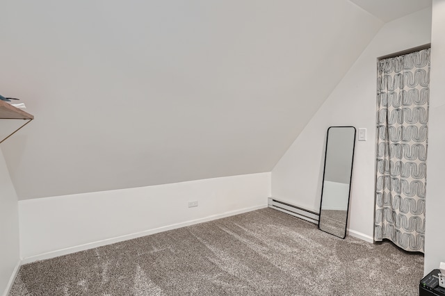 additional living space featuring carpet flooring, vaulted ceiling, and baseboard heating