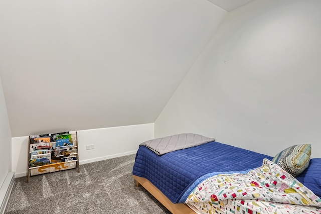 bedroom with dark colored carpet and vaulted ceiling