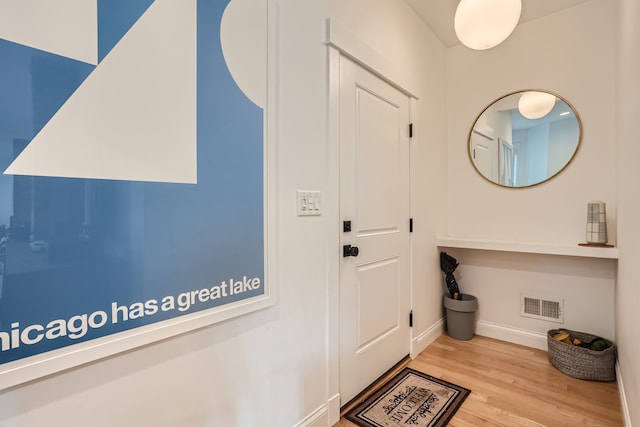 doorway featuring light hardwood / wood-style flooring