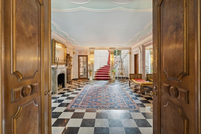 1355 N Astor St, Chicago, IL 60610 - entrance foyer with ornamental molding, tile patterned floors, and a fireplace