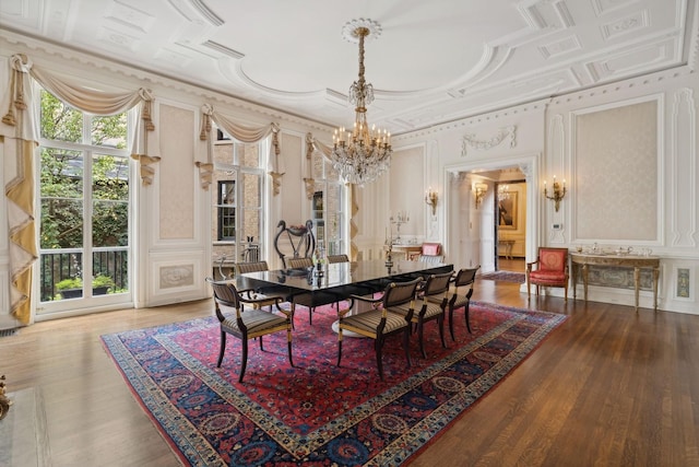 1355 N Astor St, Chicago, IL 60610 - dining room featuring ornamental molding, a notable chandelier, and wood finished floors