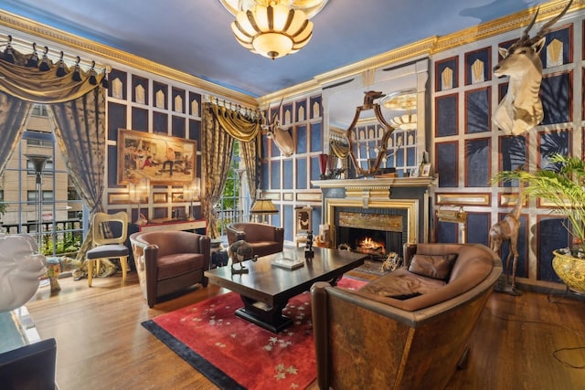 1355 N Astor St, Chicago, IL 60610 - sitting room featuring crown molding, an inviting chandelier, wood finished floors, and a high end fireplace