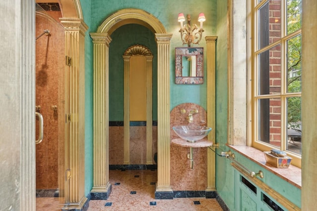 1355 N Astor St, Chicago, IL 60610 - corridor featuring a sink, ornate columns, and plenty of natural light