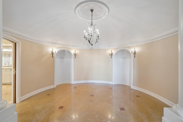 1355 N Astor St, Chicago, IL 60610 - interior space with arched walkways, a notable chandelier, ornamental molding, and a sink