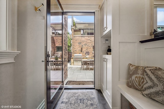 doorway featuring wood-type flooring