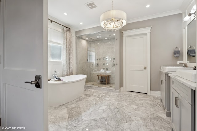 bathroom with vanity, ornamental molding, a chandelier, and independent shower and bath