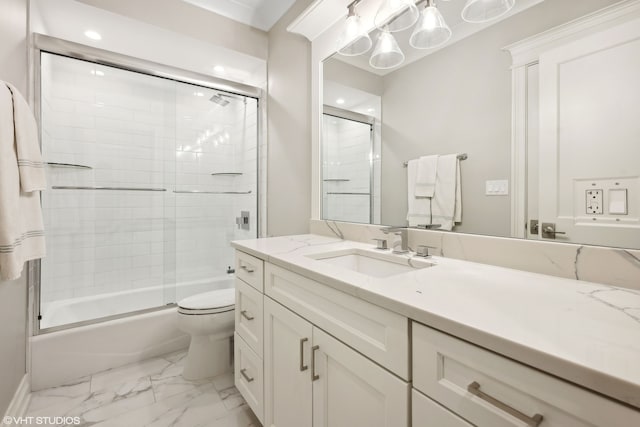 full bathroom featuring vanity, toilet, and combined bath / shower with glass door