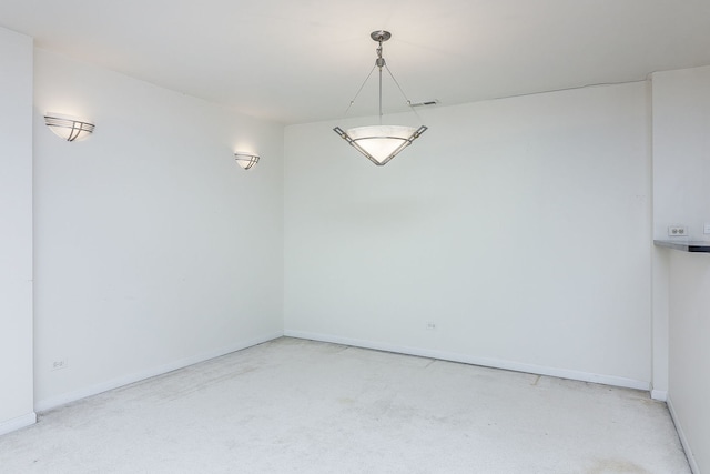 interior space with visible vents and baseboards