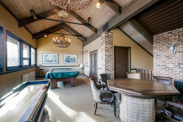 recreation room featuring brick wall, wood ceiling, an inviting chandelier, high vaulted ceiling, and beam ceiling