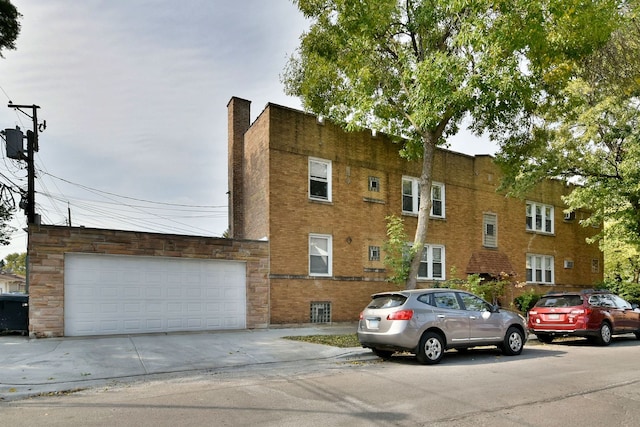 view of property featuring a garage