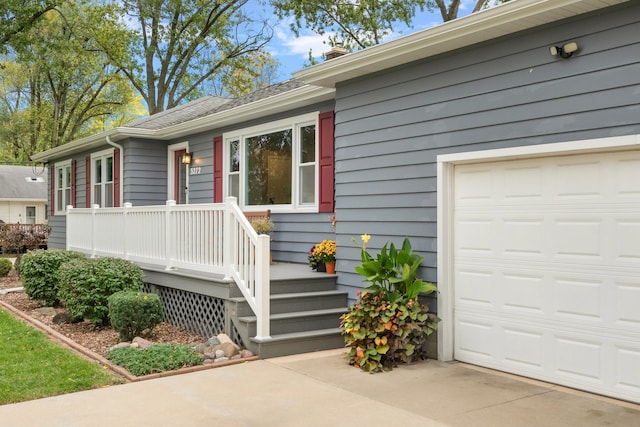 property entrance featuring a garage