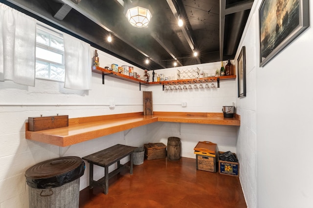 bar featuring wooden counters