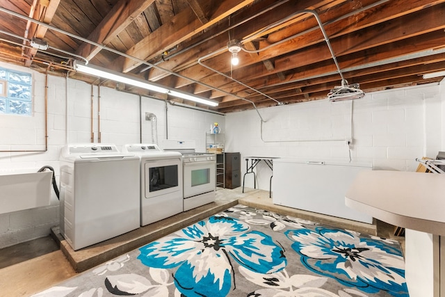 laundry area with separate washer and dryer