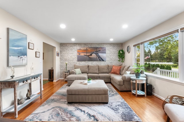 living room with light hardwood / wood-style flooring