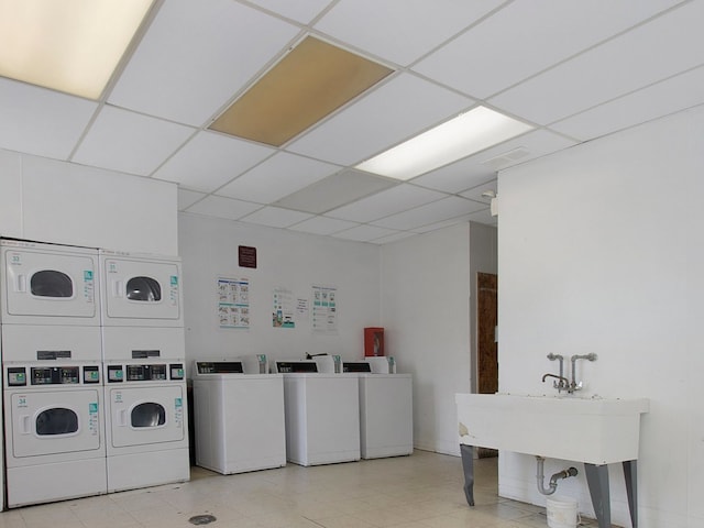 laundry room with stacked washer / dryer and independent washer and dryer