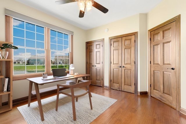 office area featuring ceiling fan and light hardwood / wood-style flooring