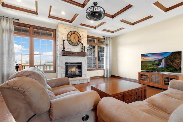 living room with coffered ceiling, hardwood / wood-style flooring, beamed ceiling, and a fireplace