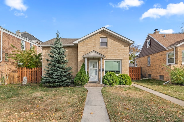 view of front of home with a front yard