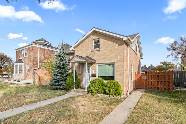 view of front of home with a front lawn