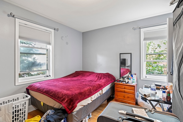 bedroom featuring wood-type flooring