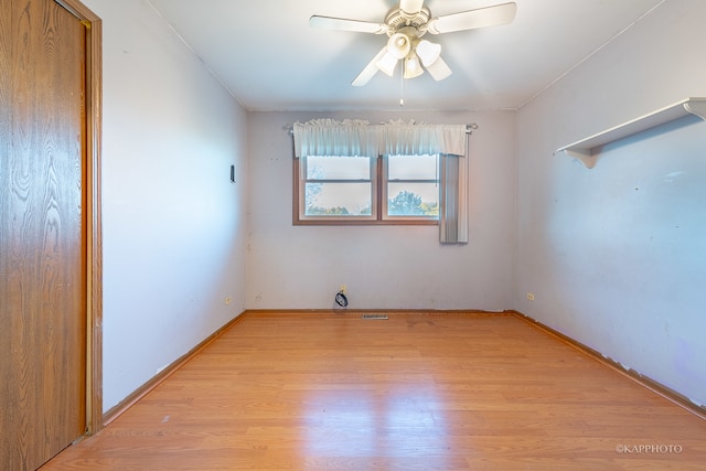 unfurnished room featuring ceiling fan and light hardwood / wood-style flooring